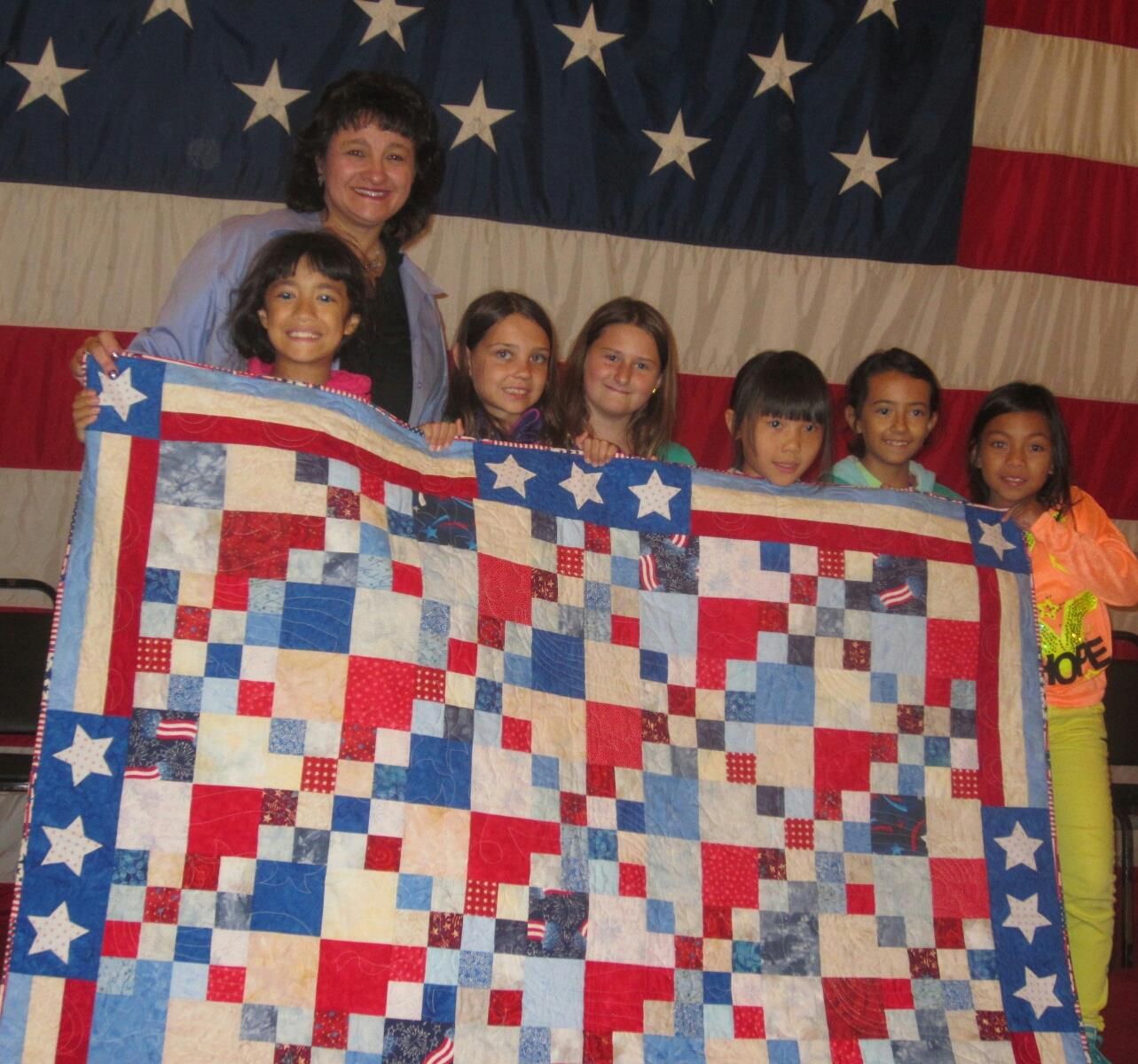 Graciela with Girl Scout Troop onboard the USS Hornet